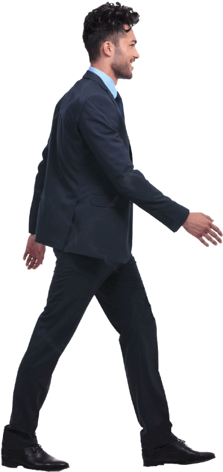 a man in a suit and tie is walking