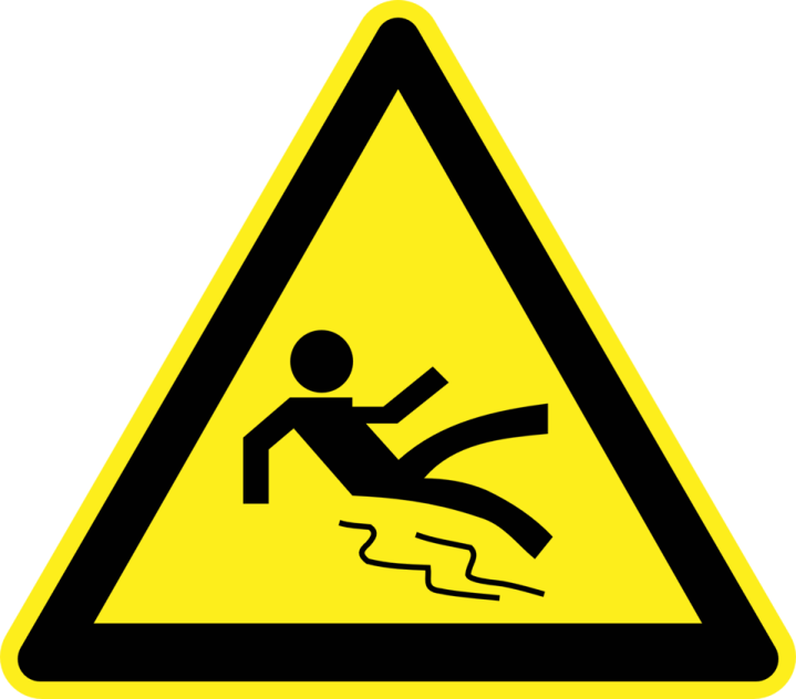 a yellow and black triangle sign with a person falling off