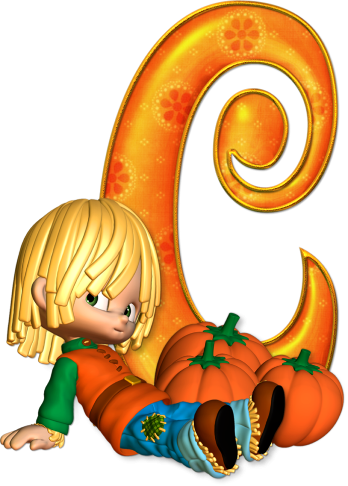 a little girl laying on the ground next to a pumpkin