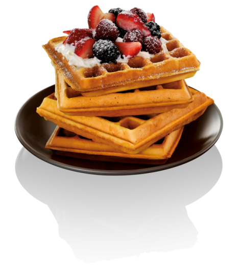 a plate with was and berries on top