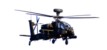 a military helicopter flying in the sky