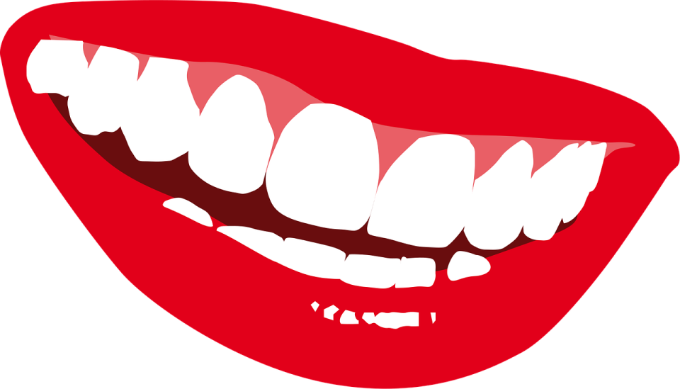 a woman's mouth with white teeth