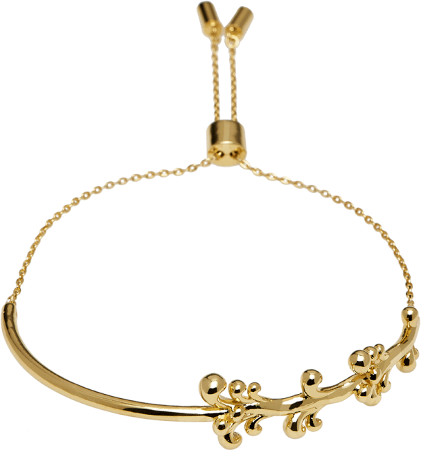 a gold bracelet with flowers on it