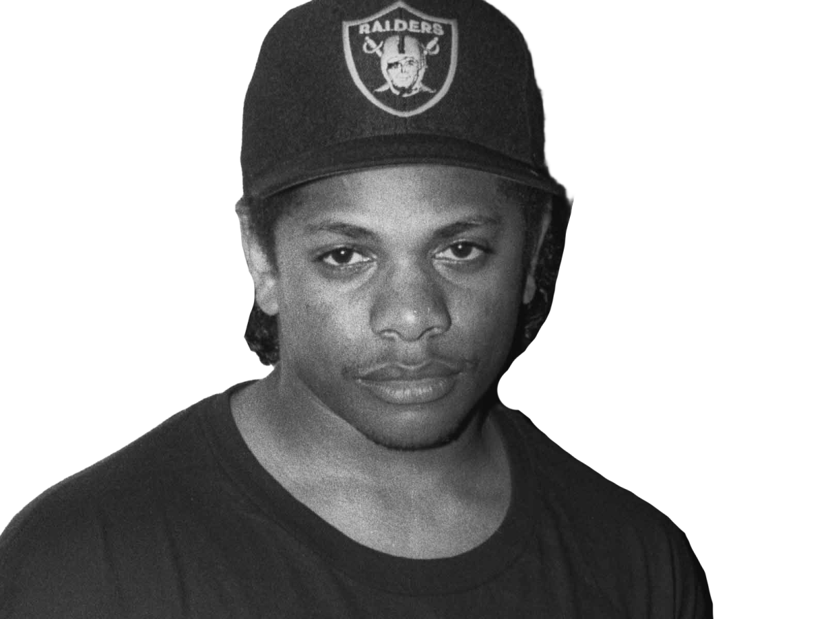 a black and white photo of a man wearing a hat