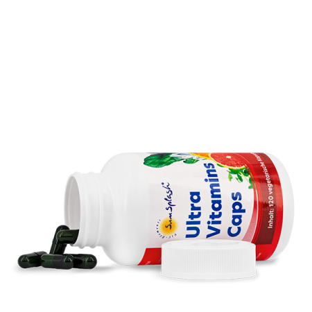 a bottle of vitamin capsules on white background