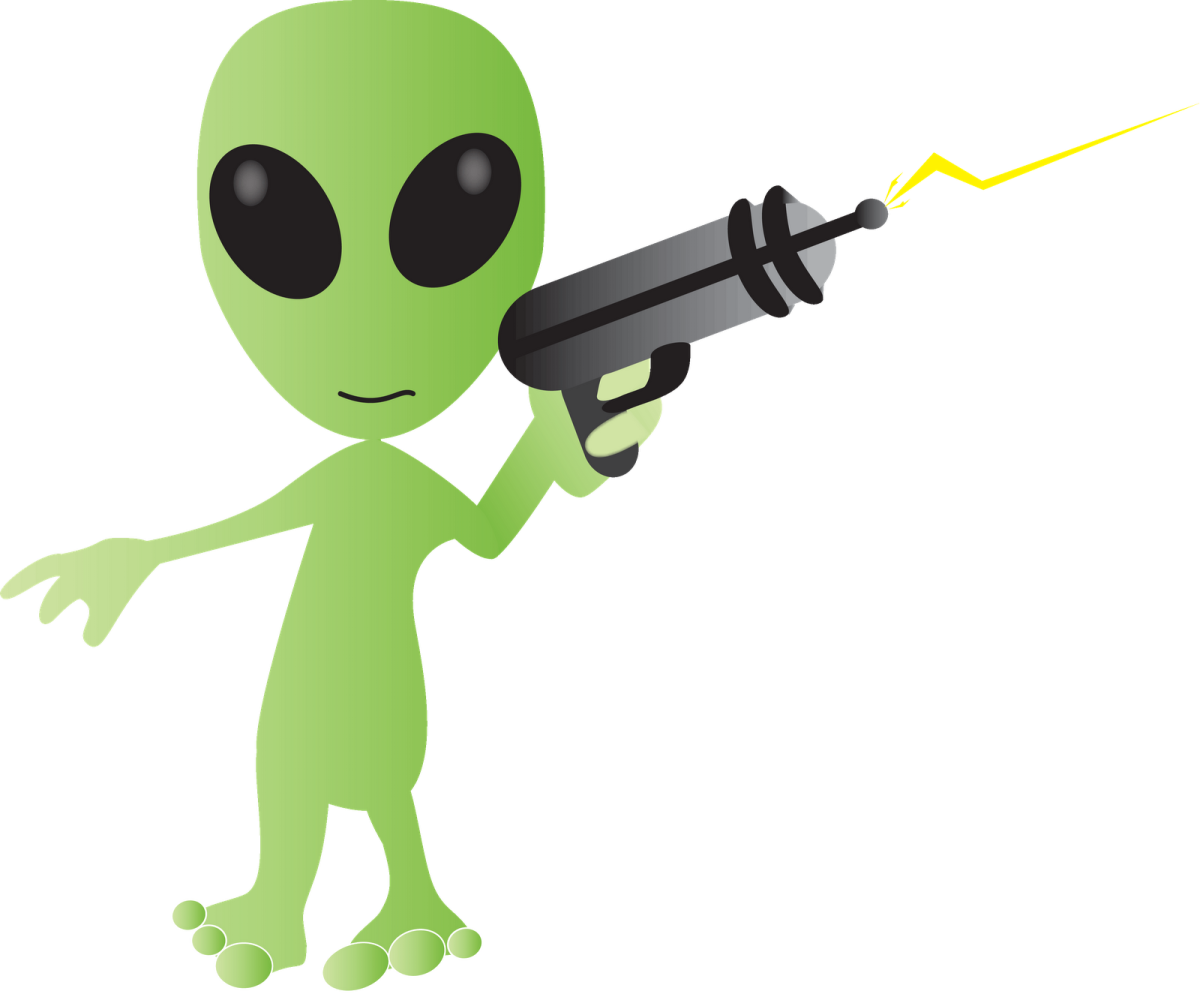 an alien with a gun in his hand