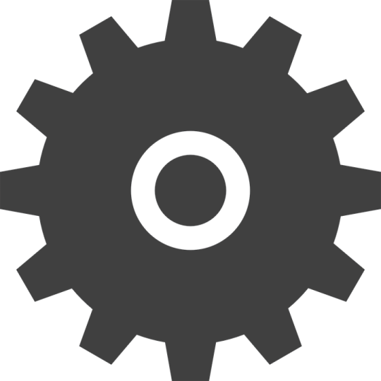 a black and white image of a gear