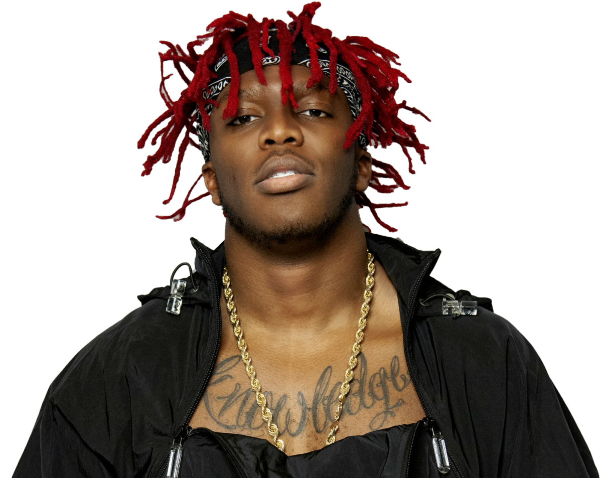 a man with red dread hair wearing a black jacket