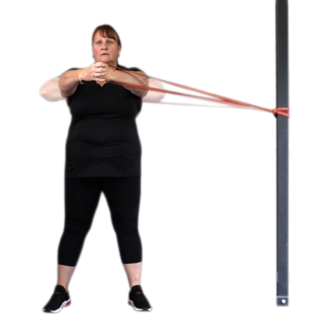 a woman in black shirt and black leggings holding a red resistance rope