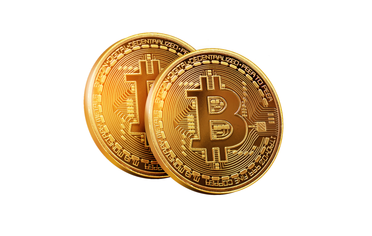 a pair of gold bitcoin coins