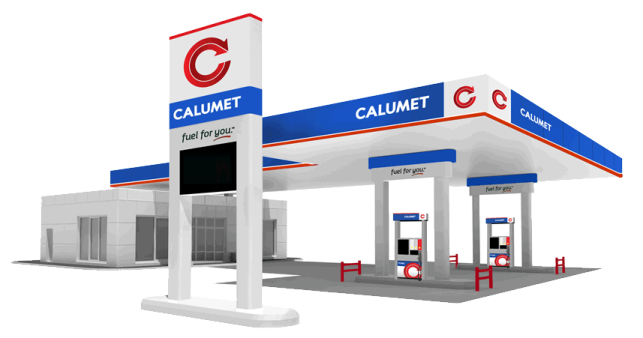 a white gas station with a blue and red sign