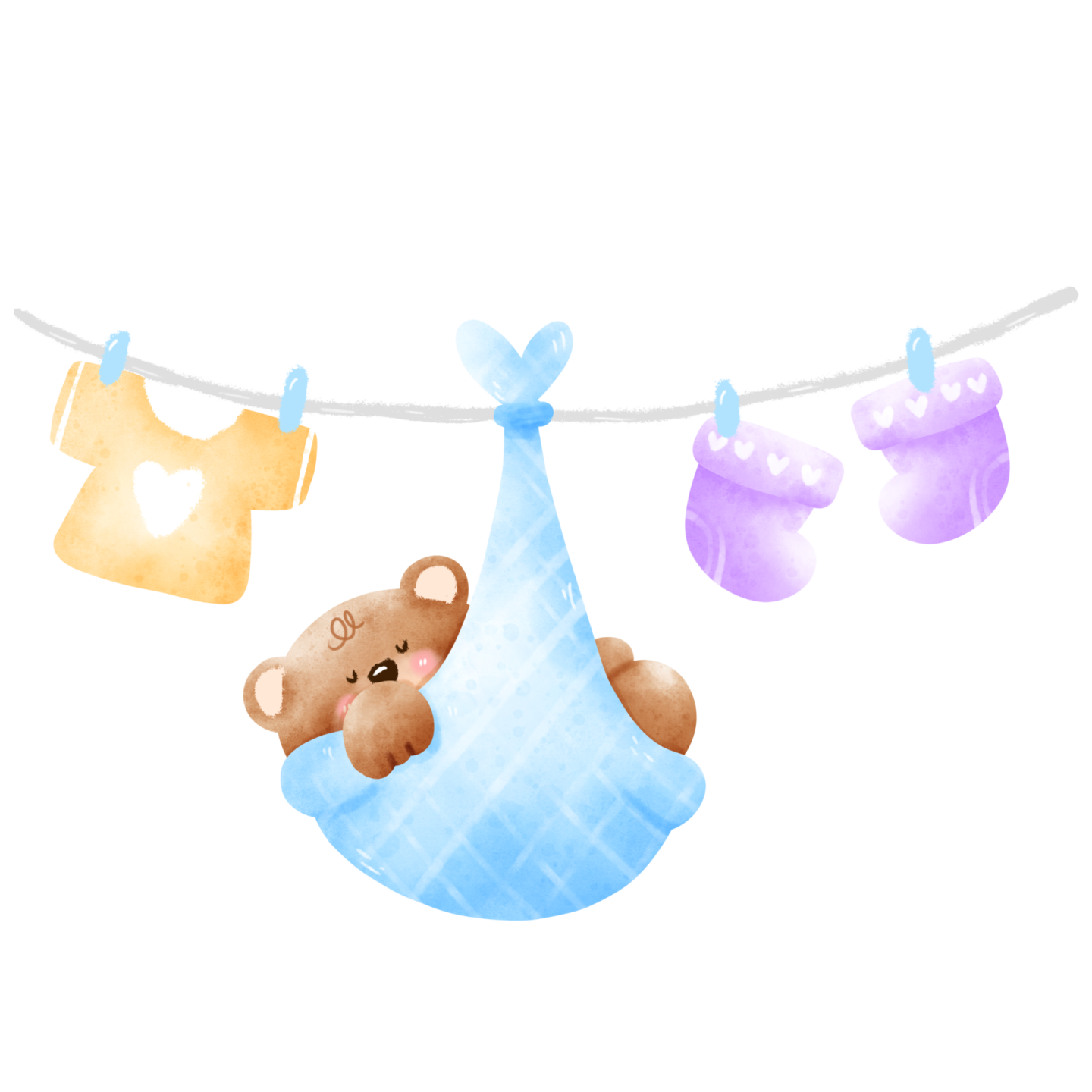 a teddy bear hanging on a clothes line