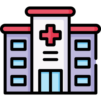 a hospital building with a cross on the front