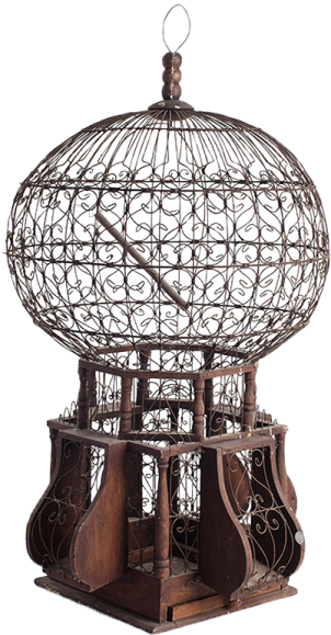 a metal sculpture of a bird in a cage