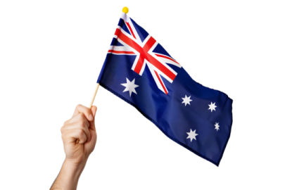 a hand holding an australian flag