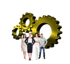 a group of people standing next to a gear wheel