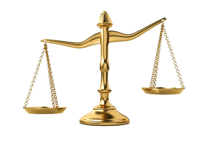 a golden balance scale on a white background