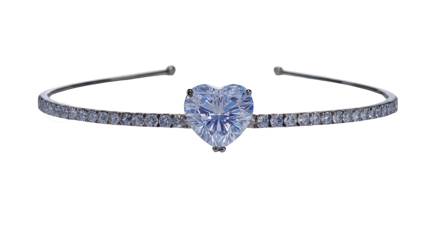 a heart shaped blue sapphire and diamond bracelet