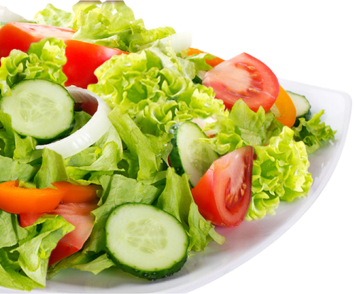 a white plate with a salad on it
