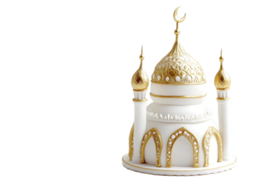 a white cake with gold decorations on top