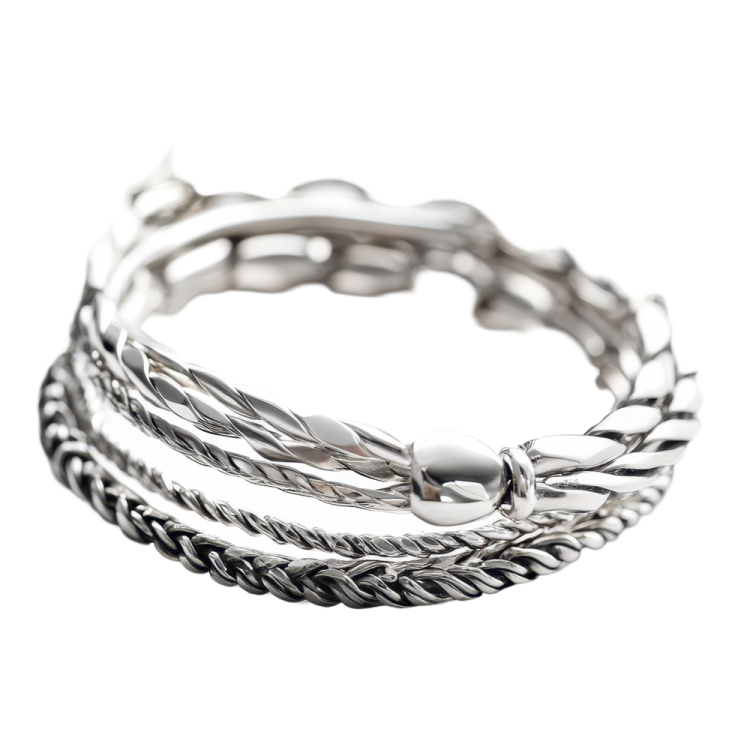 a stack of silver rings on a white background