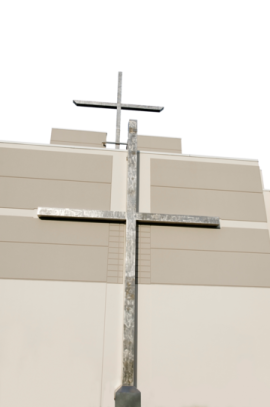 a cross on top of a building