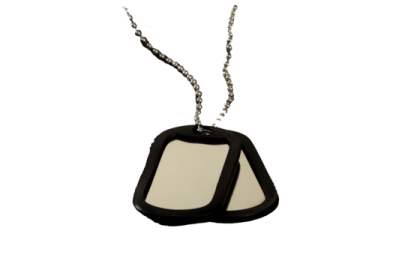 a black and white dog tag on a chain