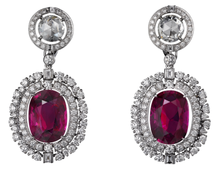 a pair of ruby and diamond earrings