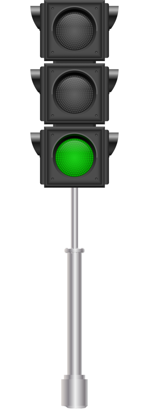 a green traffic light on a white background