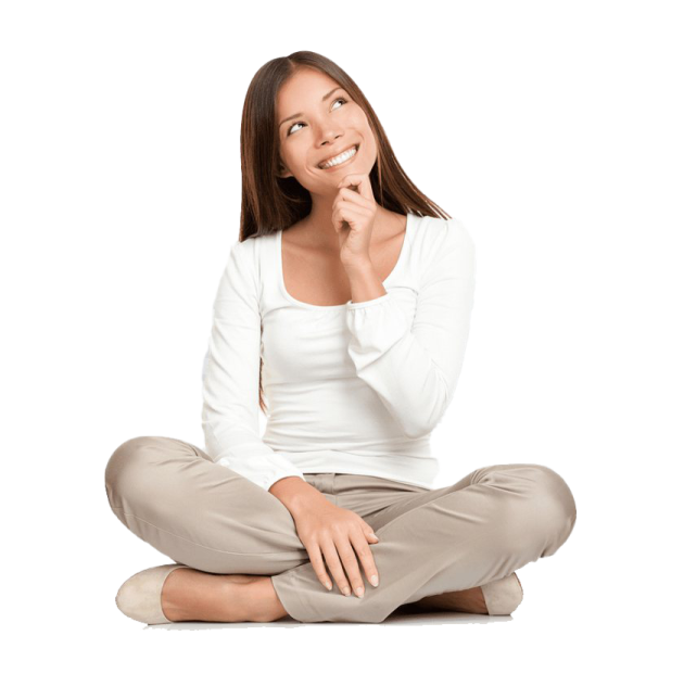 a woman sitting on the floor with her hand to her mouth
