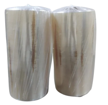 a pair of white marble candles on a white background