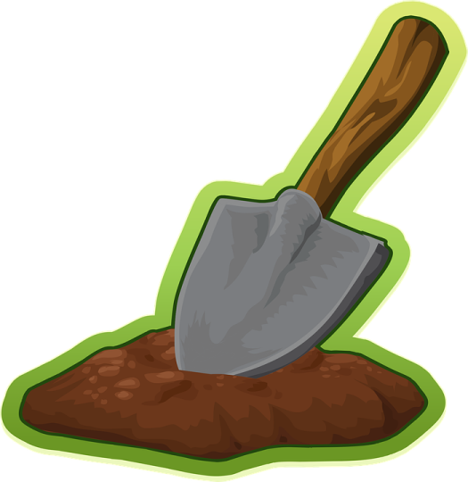 a shovel in the ground
