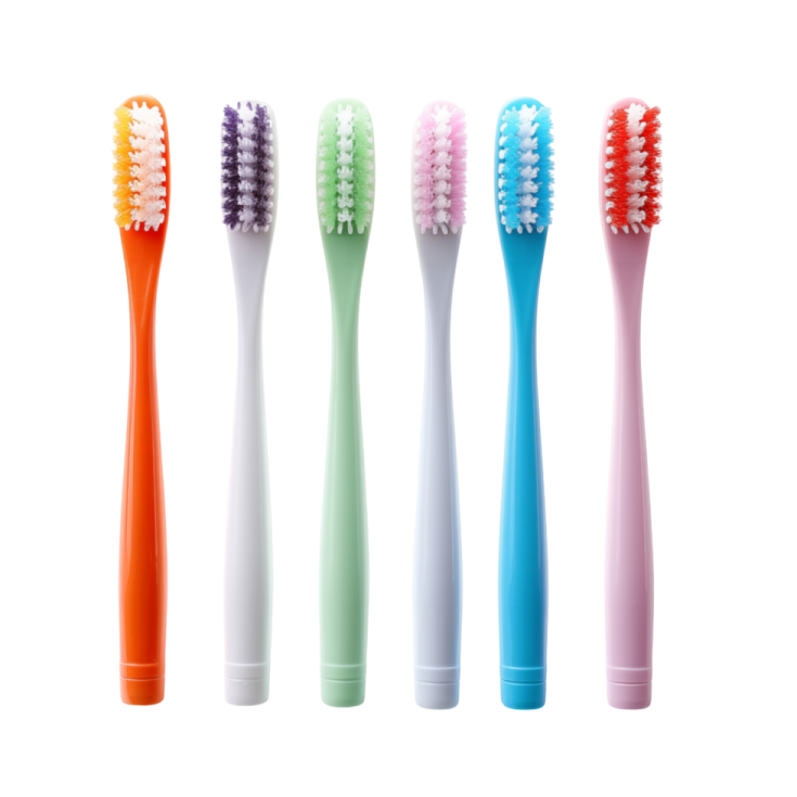 four different colored toothbrushs on a white background