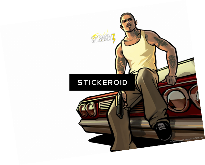 a man sitting on top of a car