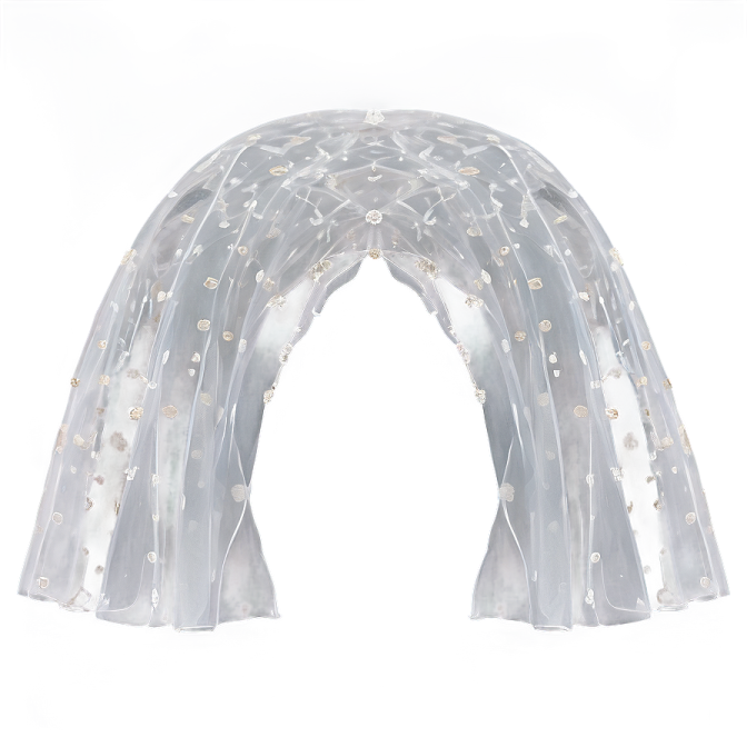 a white arch with gold and silver decorations