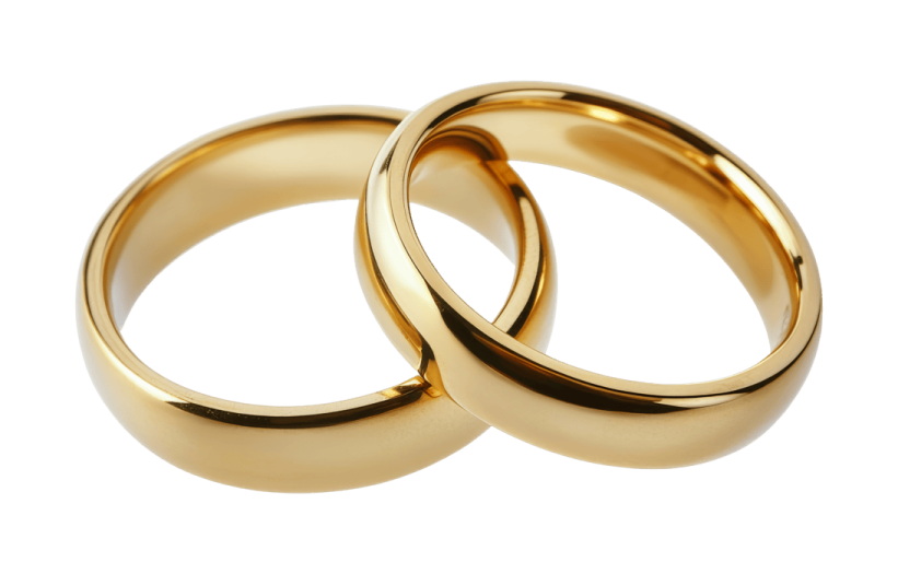 a pair of gold wedding rings
