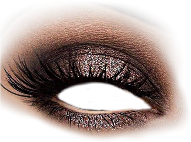 a close up of a brown eye with glitters