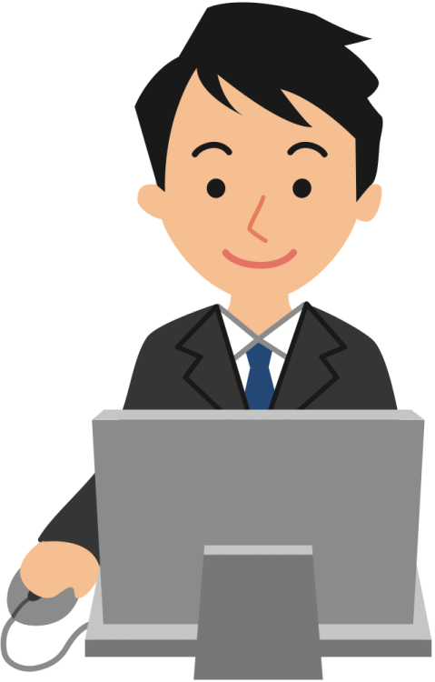 a man in a suit working on a laptop