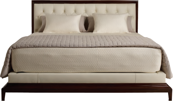a bed with two pillows on top of it