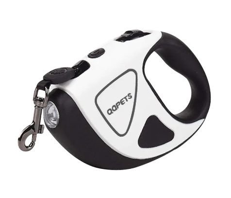 a white and black dog toy with a keychai