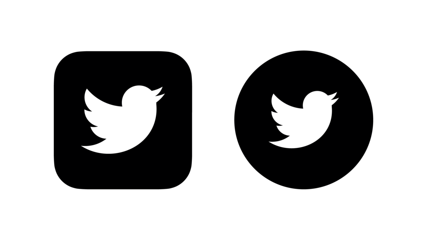 a black and white photo of two twitter logos