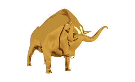 a gold bull on a white background
