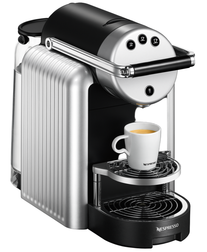 a coffee machine with a cup on top