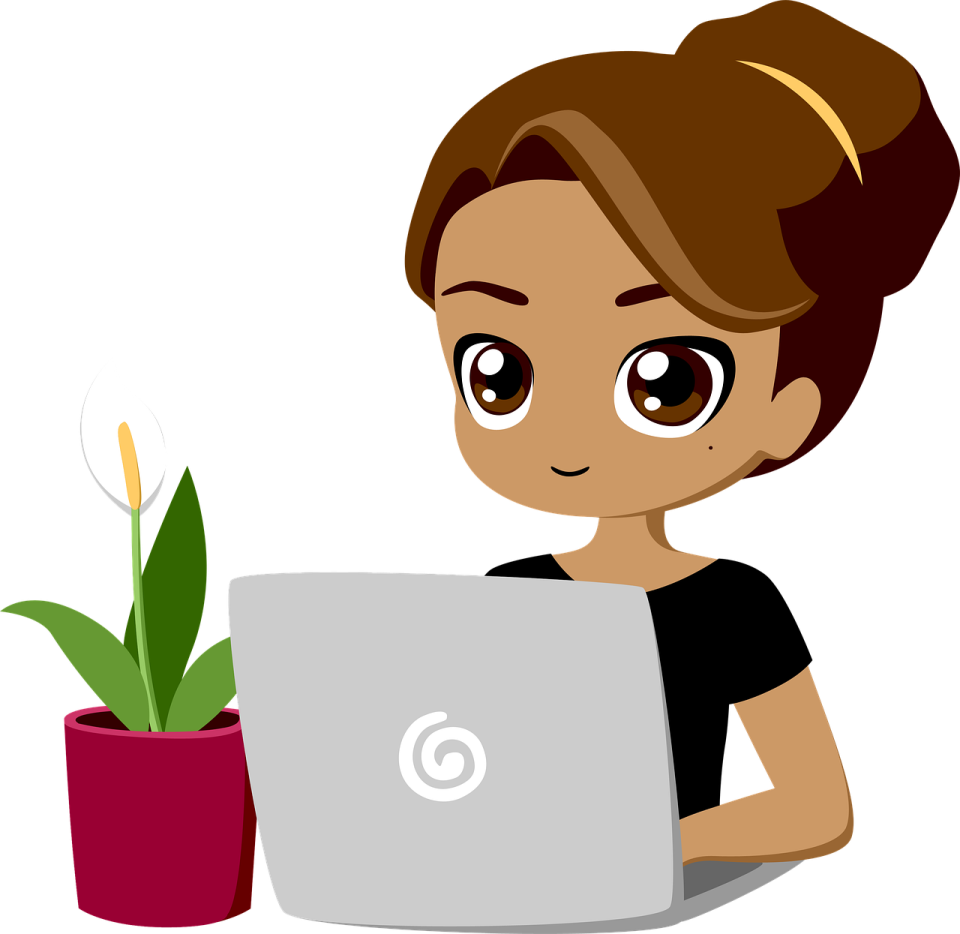 a woman sitting at a desk with a laptop