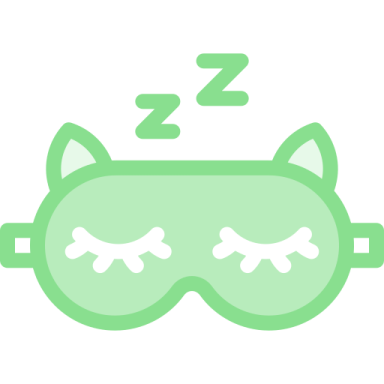 a green cat sleeping mask with eyes closed