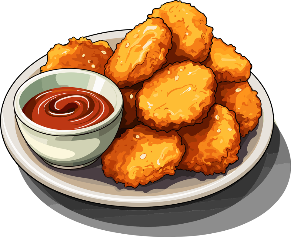 a plate of fried chicken with dipping sauce