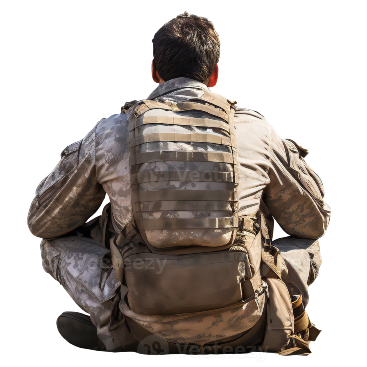 a man with a backpack sitting on the ground