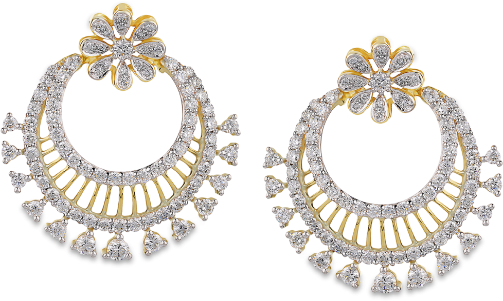 a pair of gold and diamond earrings