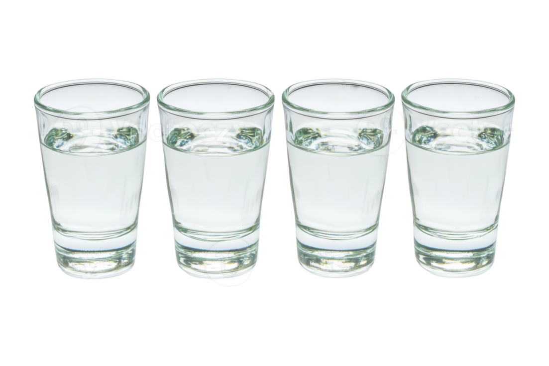 four shot glasses on a white background