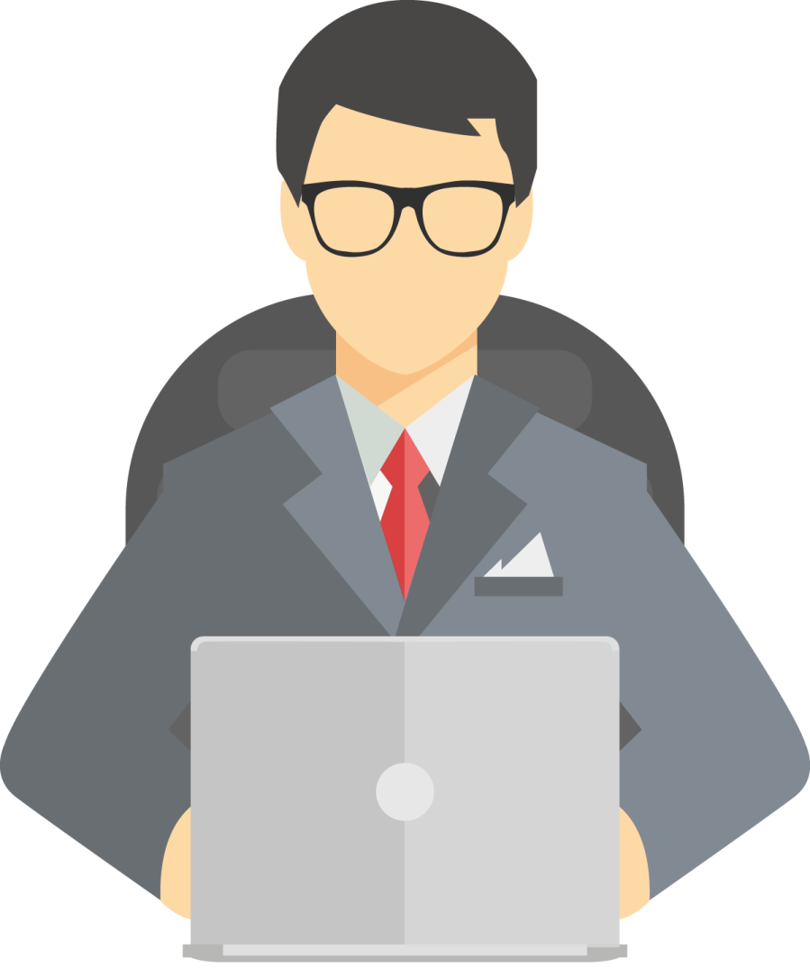 a man in a suit and glasses working on a laptop